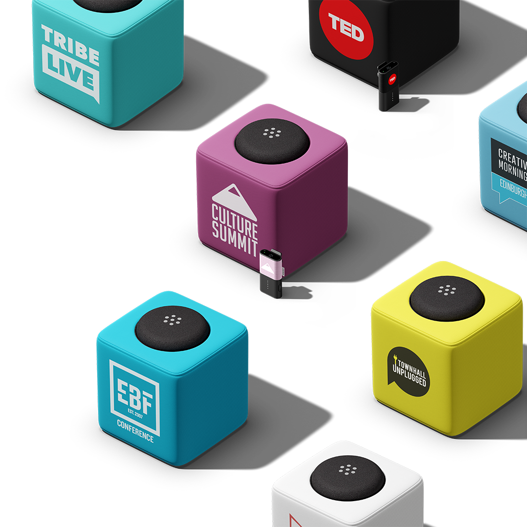 A showcase of customized Catchbox Cube and Clip microphones with branded covers from various conferences and events